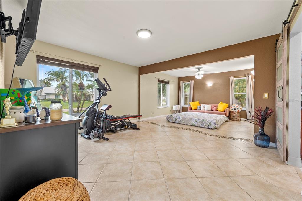 1041 Southwest General Patton Terrace Port St. Lucie, FL 34953 - Photo 14 of 39 a view of a livingroom with furniture and windows