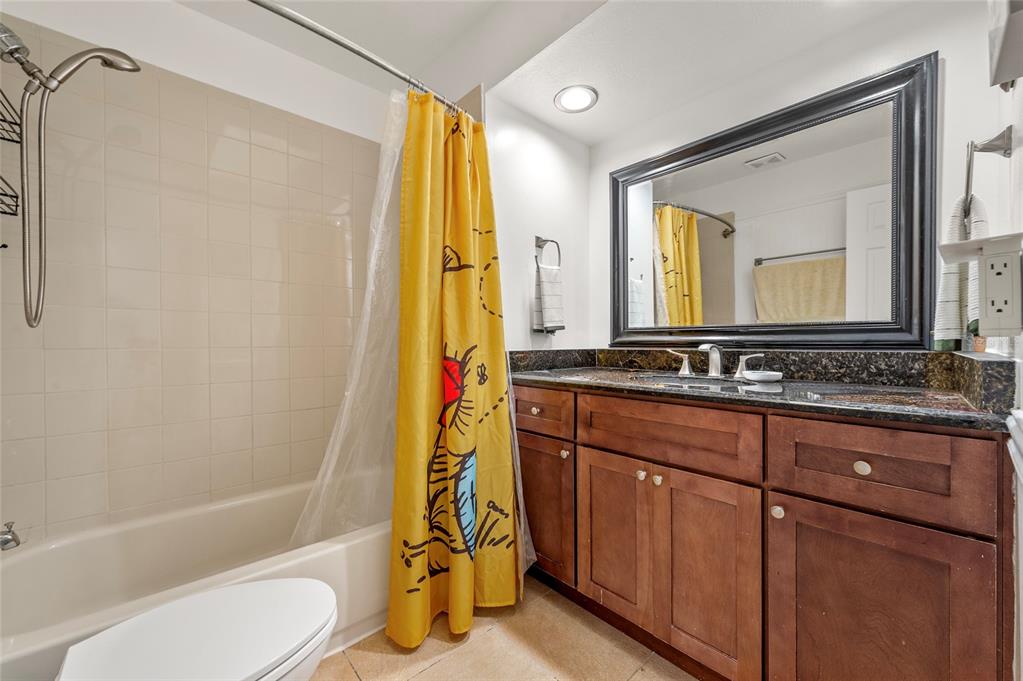 1041 Southwest General Patton Terrace Port St. Lucie, FL 34953 - Photo 20 of 39 a bathroom with a granite countertop sink and a mirror