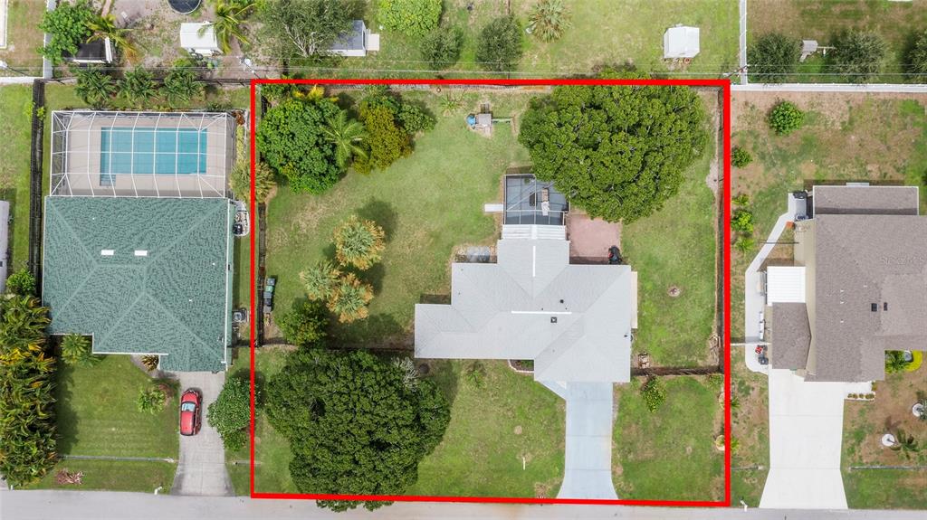 1041 Southwest General Patton Terrace Port St. Lucie, FL 34953 - Photo 2 of 39 an aerial view of a house