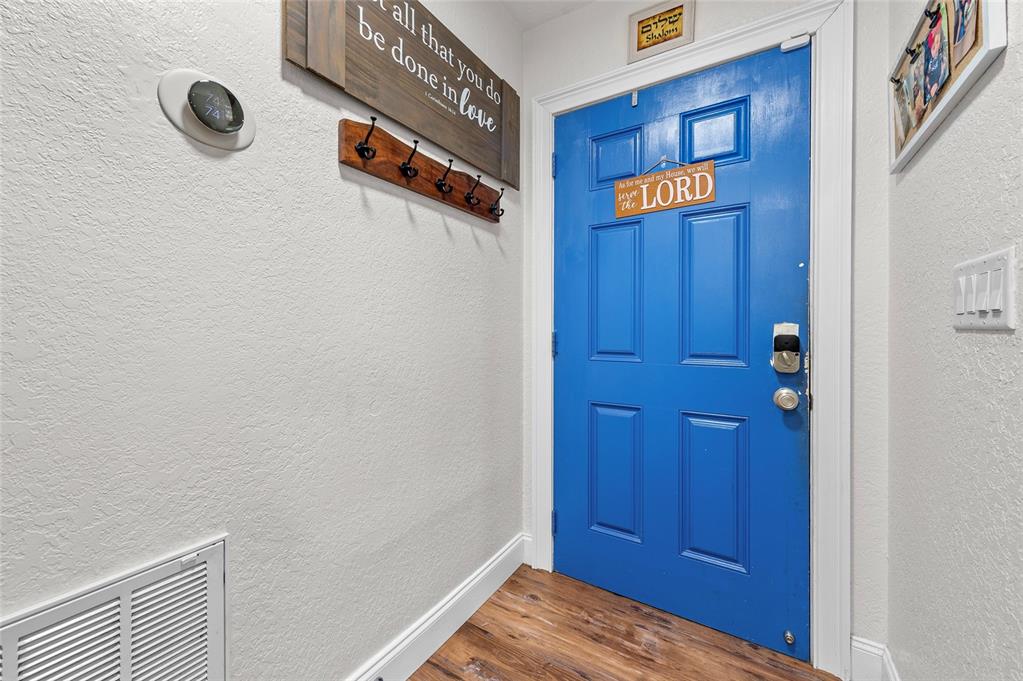 1041 Southwest General Patton Terrace Port St. Lucie, FL 34953 - Photo 3 of 39 a view of a hallway