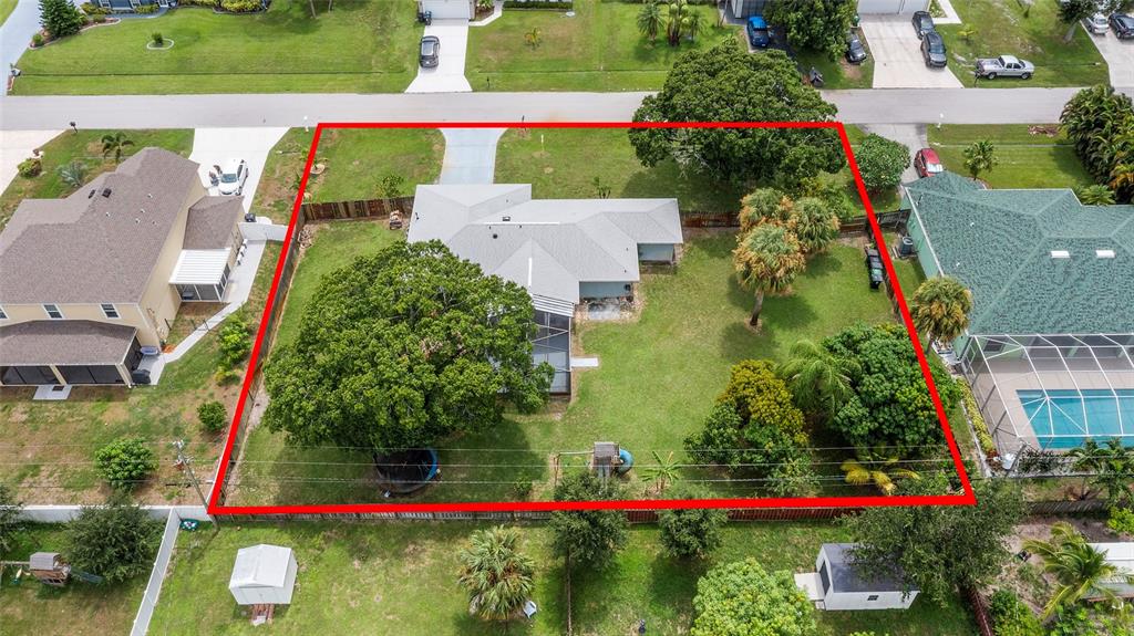 1041 Southwest General Patton Terrace Port St. Lucie, FL 34953 - Photo 36 of 39 an aerial view of house and yard