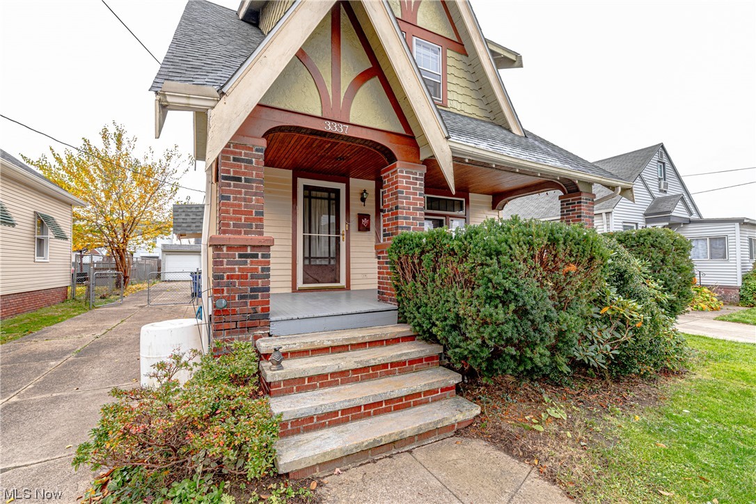 3337 Ralph Avenue Cleveland, OH 44109 - Photo 3 of 30 View of front facade featuring a porch