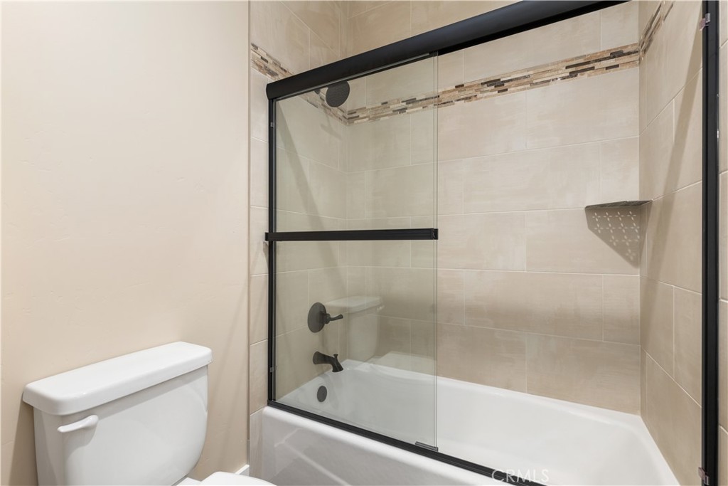 132 Burket Place Paso Robles, CA 93446 - Photo 18 of 30 a bathroom with a shower and a toilet