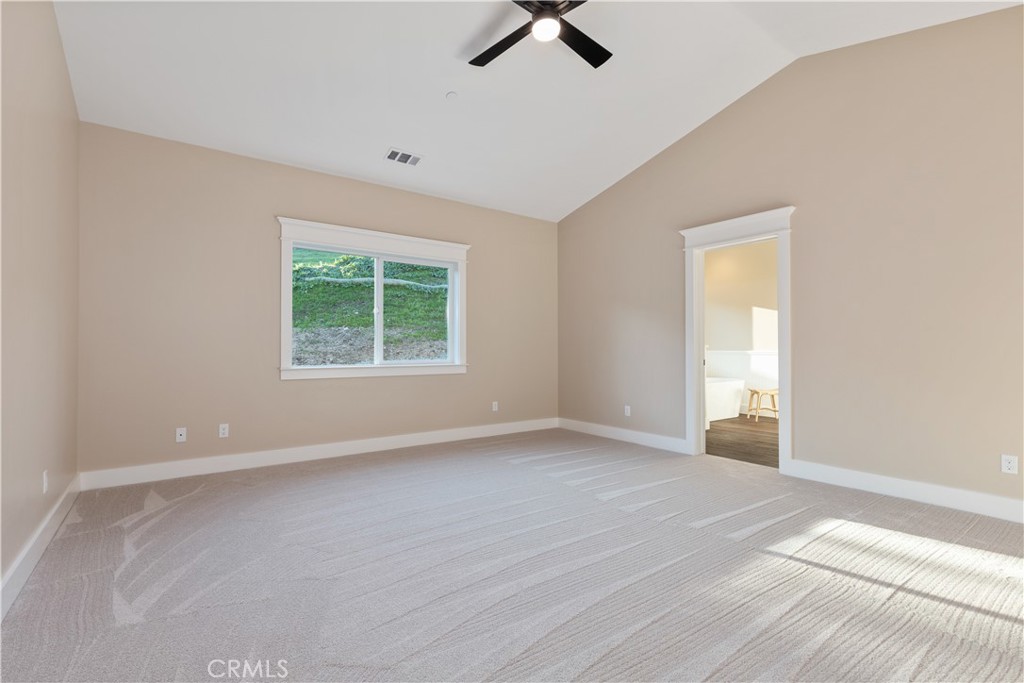 132 Burket Place Paso Robles, CA 93446 - Photo 21 of 30 an empty room with windows and fan