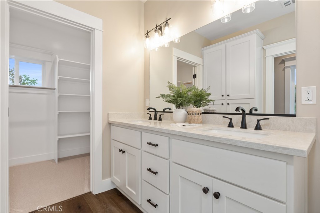 132 Burket Place Paso Robles, CA 93446 - Photo 23 of 30 a bathroom with a sink and a mirror