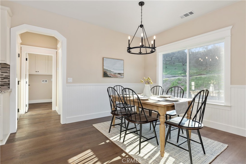 132 Burket Place Paso Robles, CA 93446 - Photo 7 of 30 a view of a dining room with furniture window and wooden floor