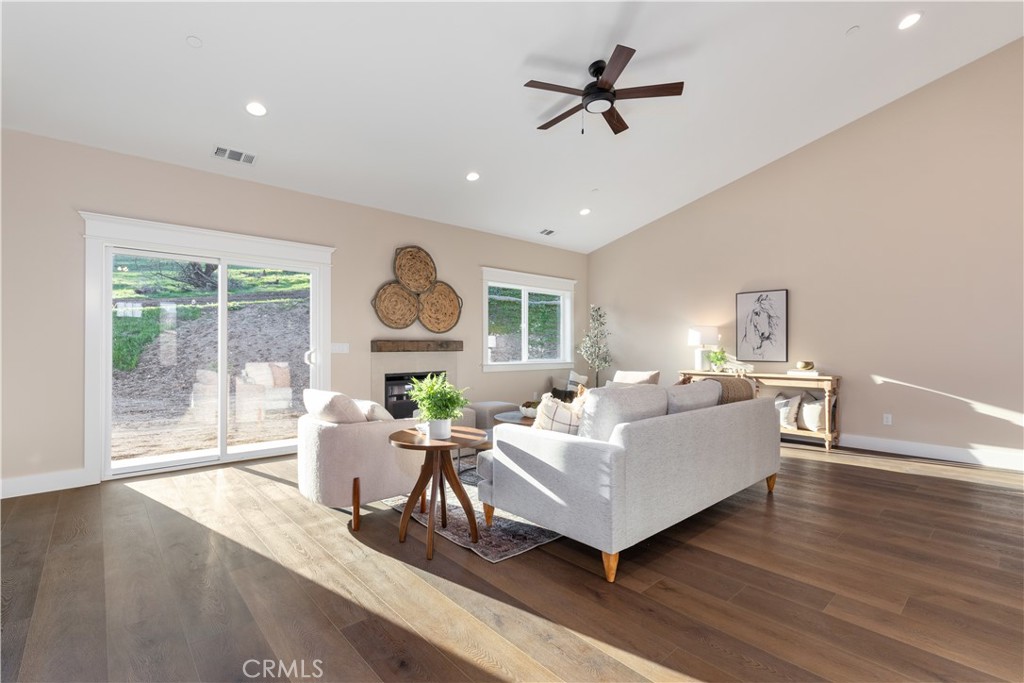132 Burket Place Paso Robles, CA 93446 - Photo 9 of 30 a living room with furniture large window and wooden floor