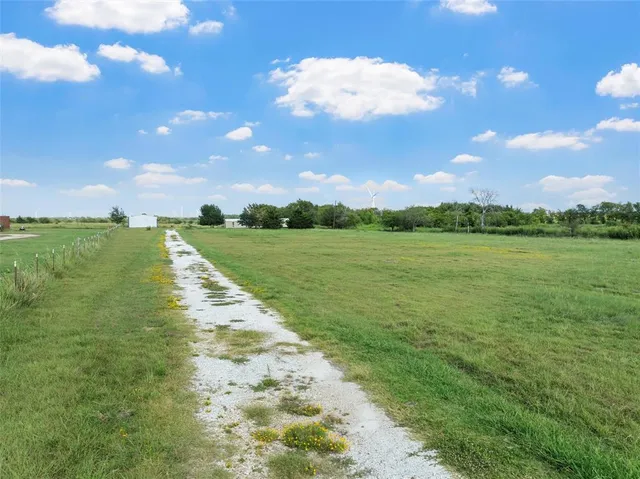 a view of an ocean beach and city