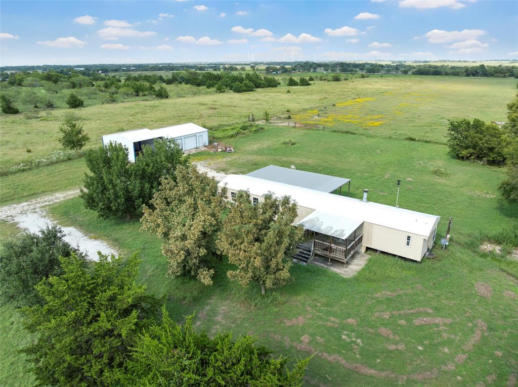 379 Neighbors Corner Road Mart, TX 76664 - Photo 10 of 15 a view of a garden with lawn chairs
