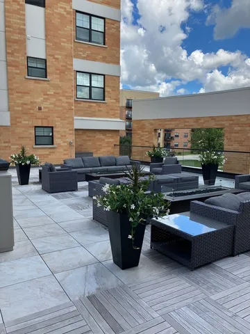 a room with a refrigerator and sink