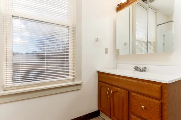 a bathroom with a sink and a vanity