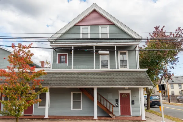 a front view of a house with glass windows