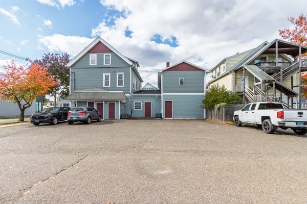 a view of a car park in front of house