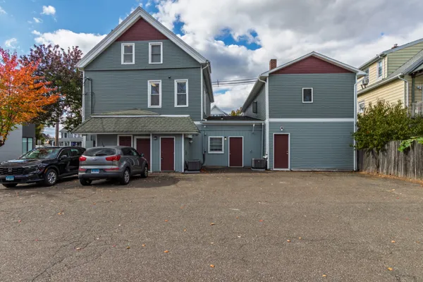 a car parked in front of a house