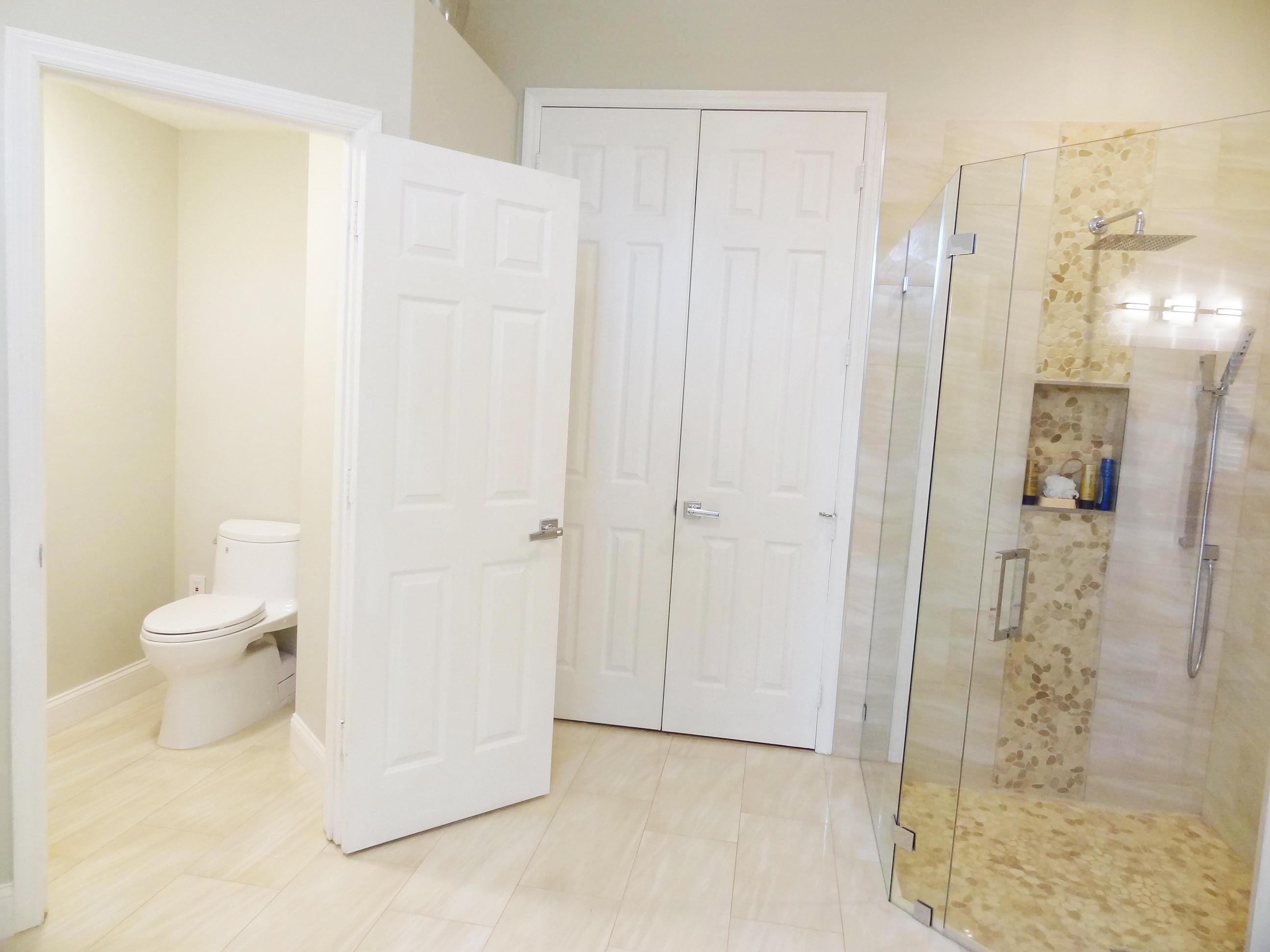 12438 Antille Drive Boca Raton, FL 33428 - Photo 12 of 30 MASTER BATHROOM W/TOTO CARLYLE TOILET