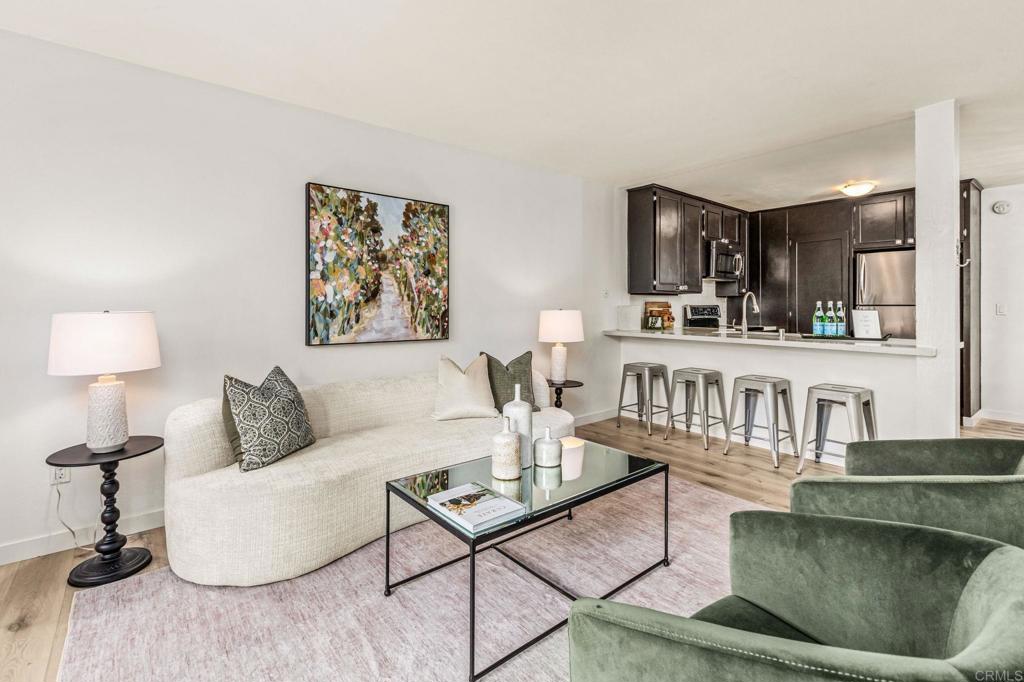 a living room with furniture and a table