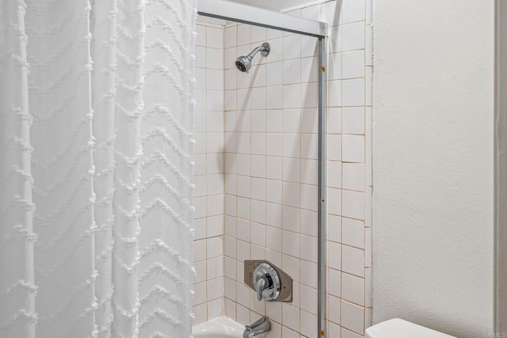 6780 Friars Road, Unit 129 San Diego, CA 92108 - Photo 20 of 50 a bathroom with a shower