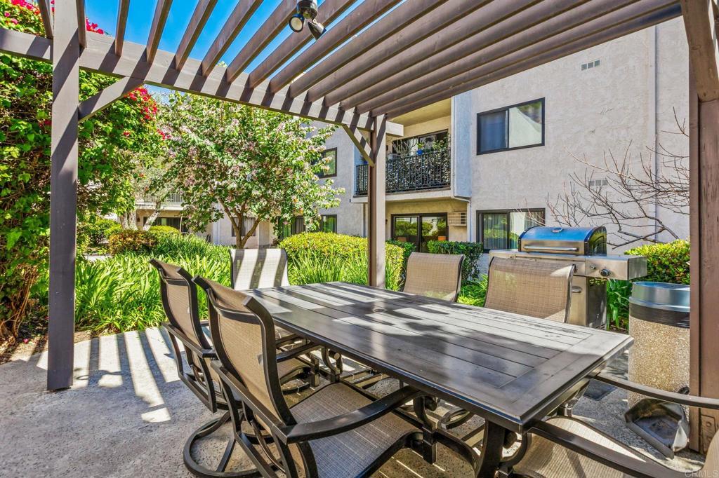6780 Friars Road, Unit 129 San Diego, CA 92108 - Photo 23 of 50 a view of an outside dining space with furniture