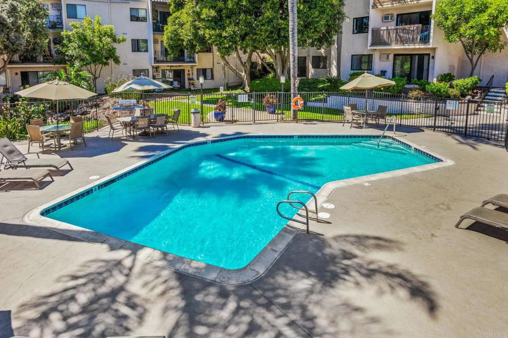 6780 Friars Road, Unit 129 San Diego, CA 92108 - Photo 33 of 50 a view of a swimming pool with a patio and plants