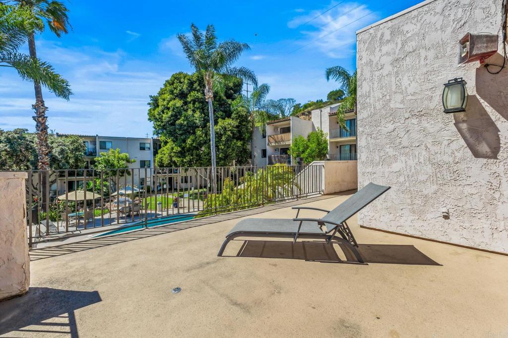 6780 Friars Road, Unit 129 San Diego, CA 92108 - Photo 37 of 50 a view of a chairs and table in backyard