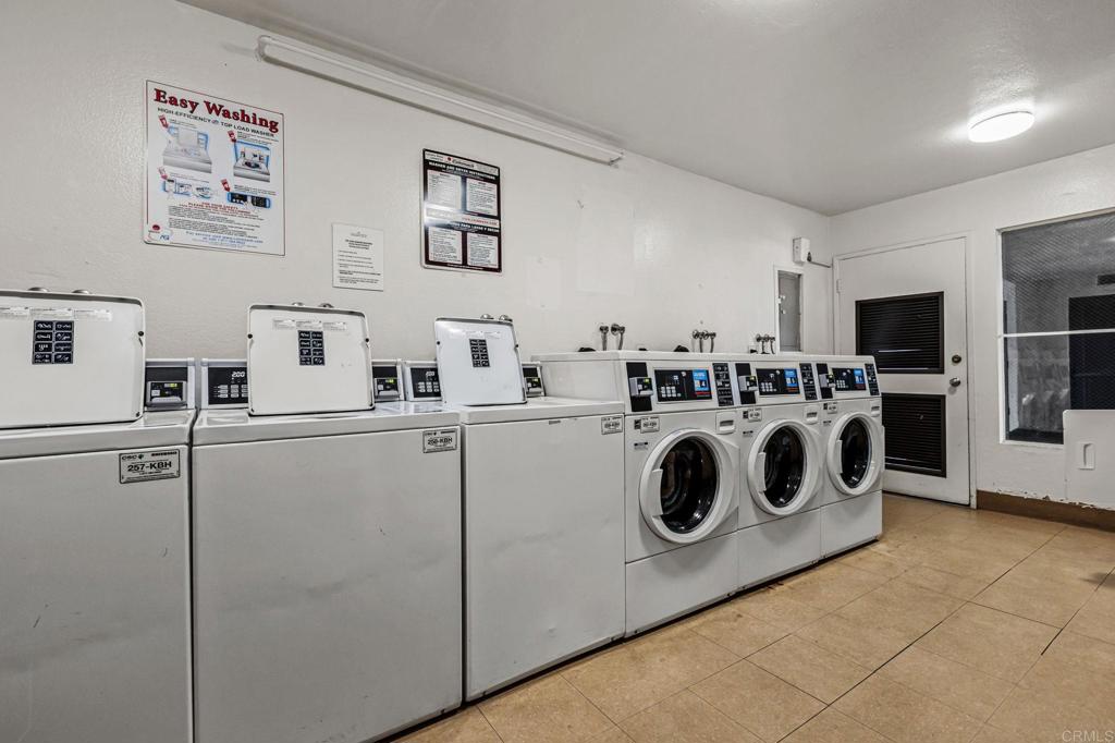 6780 Friars Road, Unit 129 San Diego, CA 92108 - Photo 42 of 50 a utility room with dryer and washer