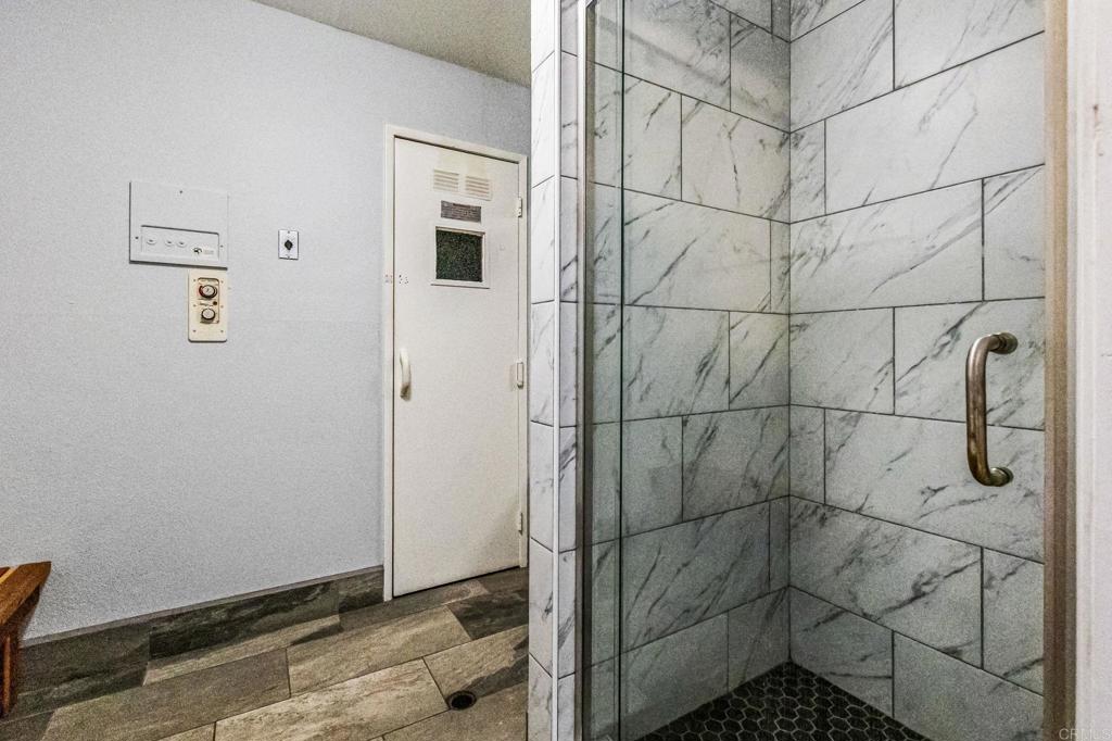 6780 Friars Road, Unit 129 San Diego, CA 92108 - Photo 43 of 50 a bathroom with a shower