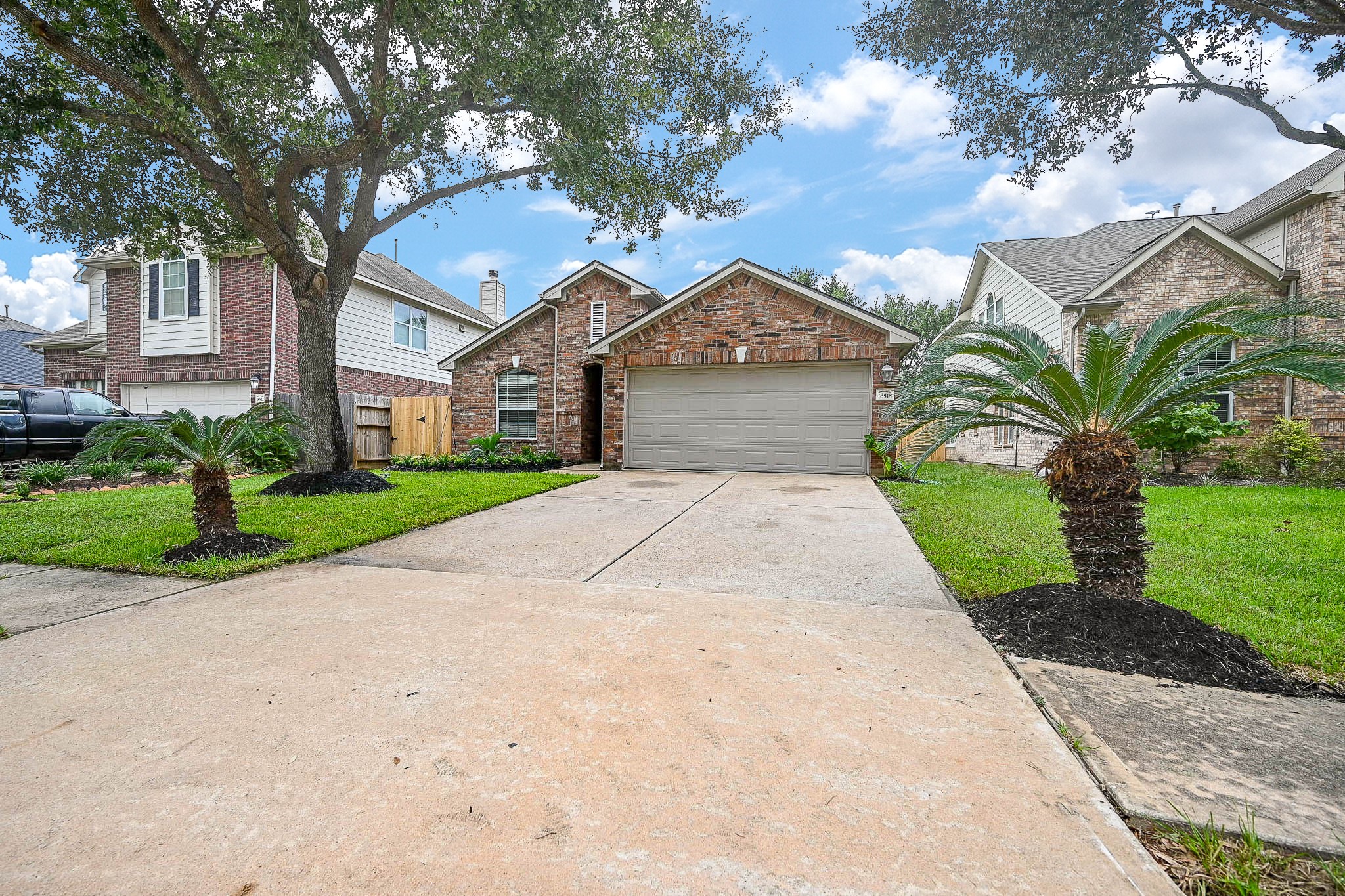 18518 Shadow Line Court Katy, TX 77449 - Photo 1 of 32 a front view of a house with a yard and garage