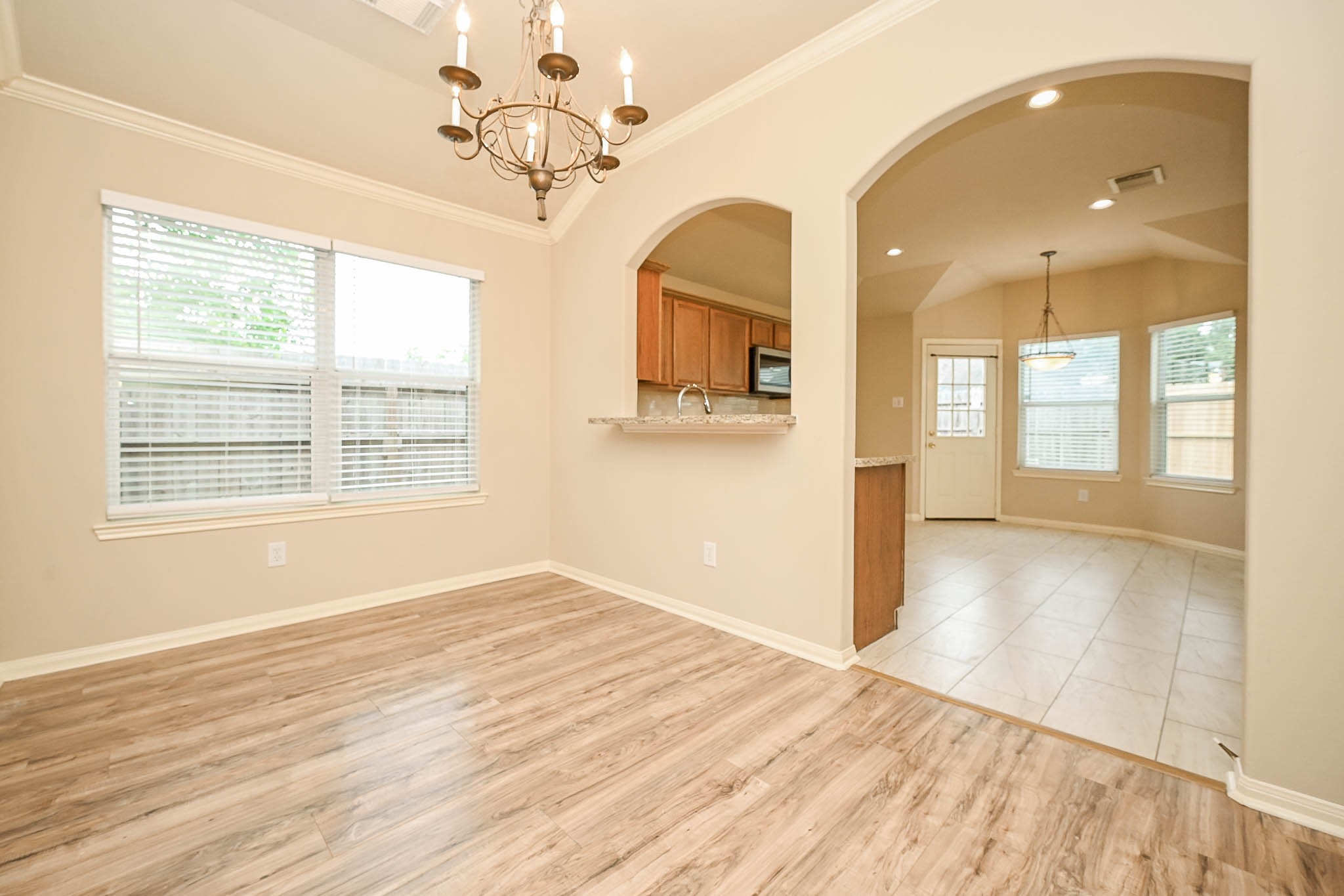 18518 Shadow Line Court Katy, TX 77449 - Photo 11 of 32 a view of livingroom with kitchen and entryway