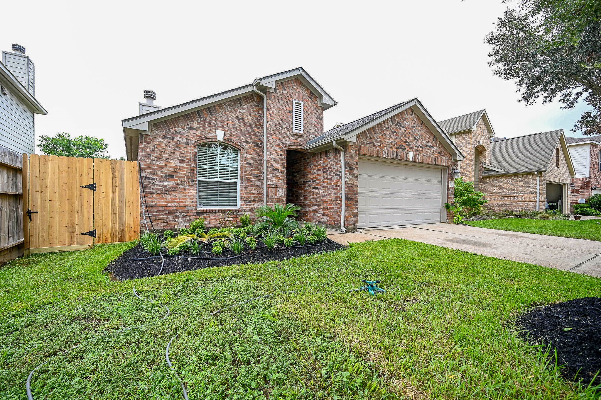18518 Shadow Line Court Katy, TX 77449 - Photo 2 of 32 a front view of a house with garden