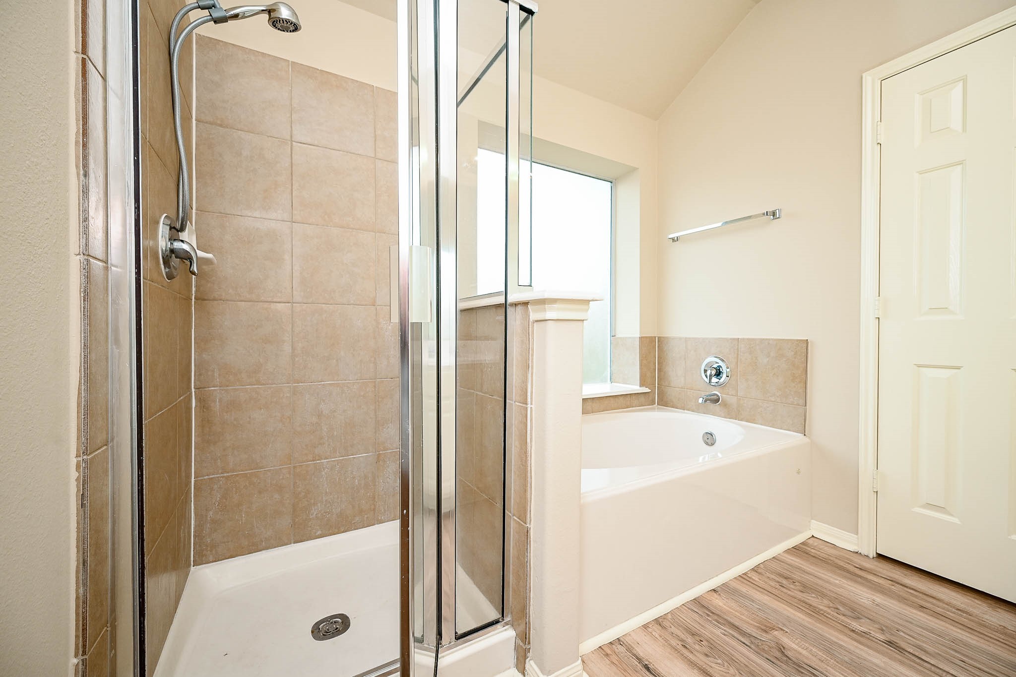 18518 Shadow Line Court Katy, TX 77449 - Photo 24 of 32 a bathroom with a bathtub and a shower