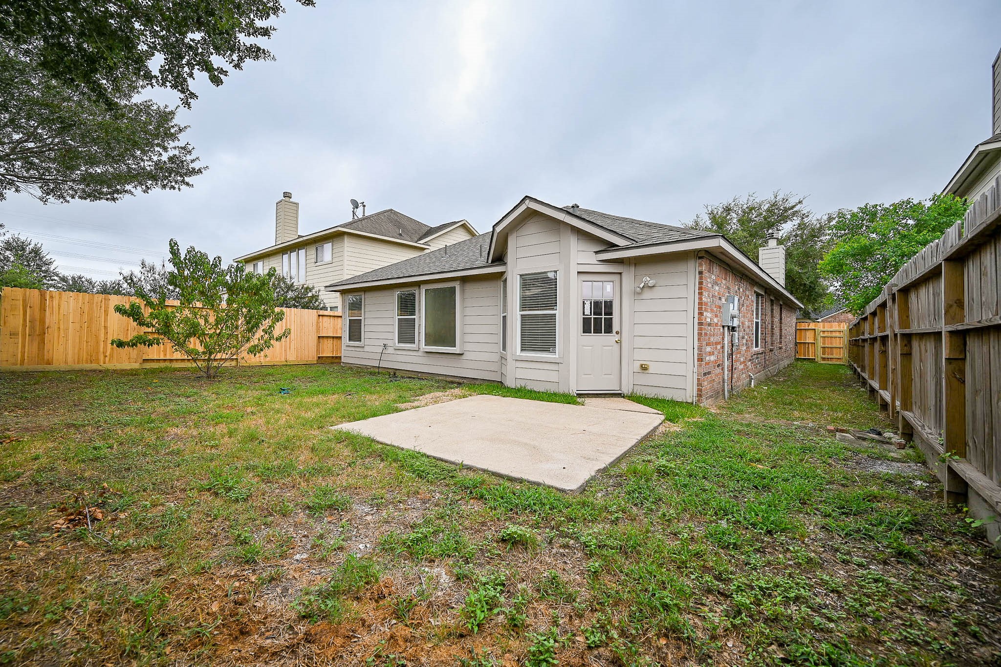 18518 Shadow Line Court Katy, TX 77449 - Photo 31 of 32 a view of a house with a yard and plants