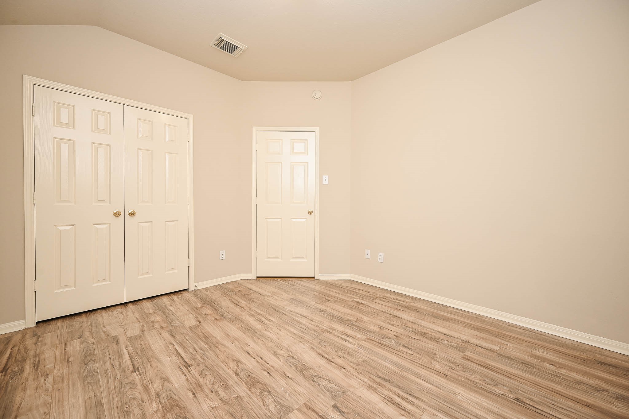 18518 Shadow Line Court Katy, TX 77449 - Photo 6 of 32 a view of an empty room with wooden floor