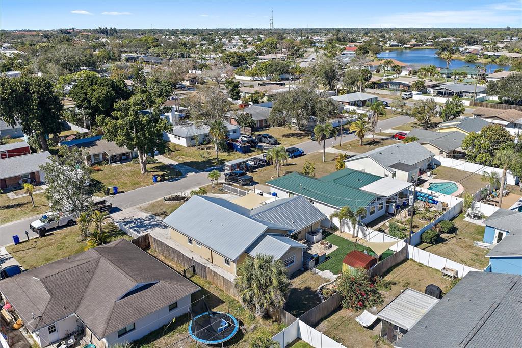 1056 Hope Street Venice, FL 34285 - Photo 25 of 27 an aerial view of a city with lots of residential buildings
