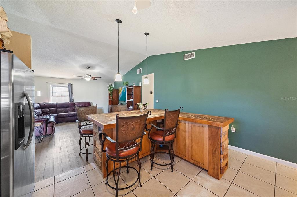 1056 Hope Street Venice, FL 34285 - Photo 8 of 27 a view of a livingroom and dining room