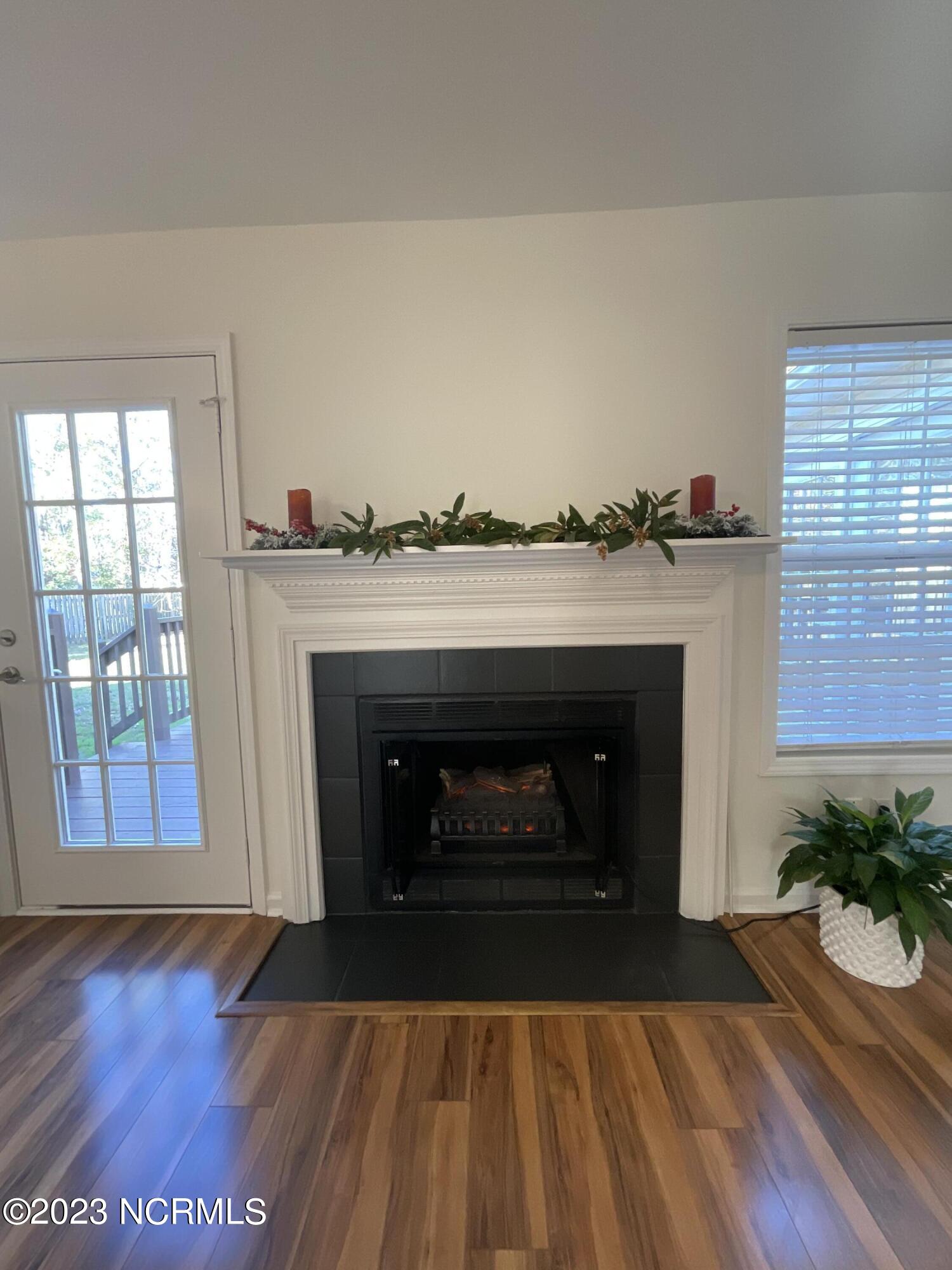 5253 Woods Edge Road Wilmington, NC 28409 - Photo 15 of 22 Fireplace with electric insert