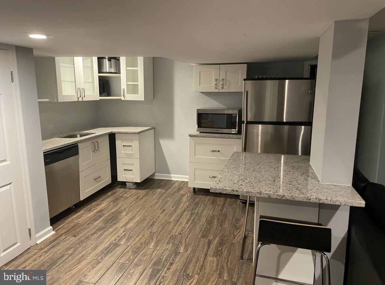 8360 Hawkins Creamery Road Gaithersburg, MD 20882 - Photo 11 of 36 Basement Kitchen