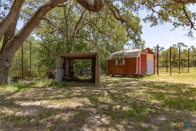 a view of a outdoor space in front of a house