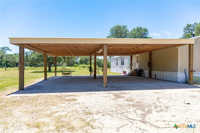 a view of a backyard of a house