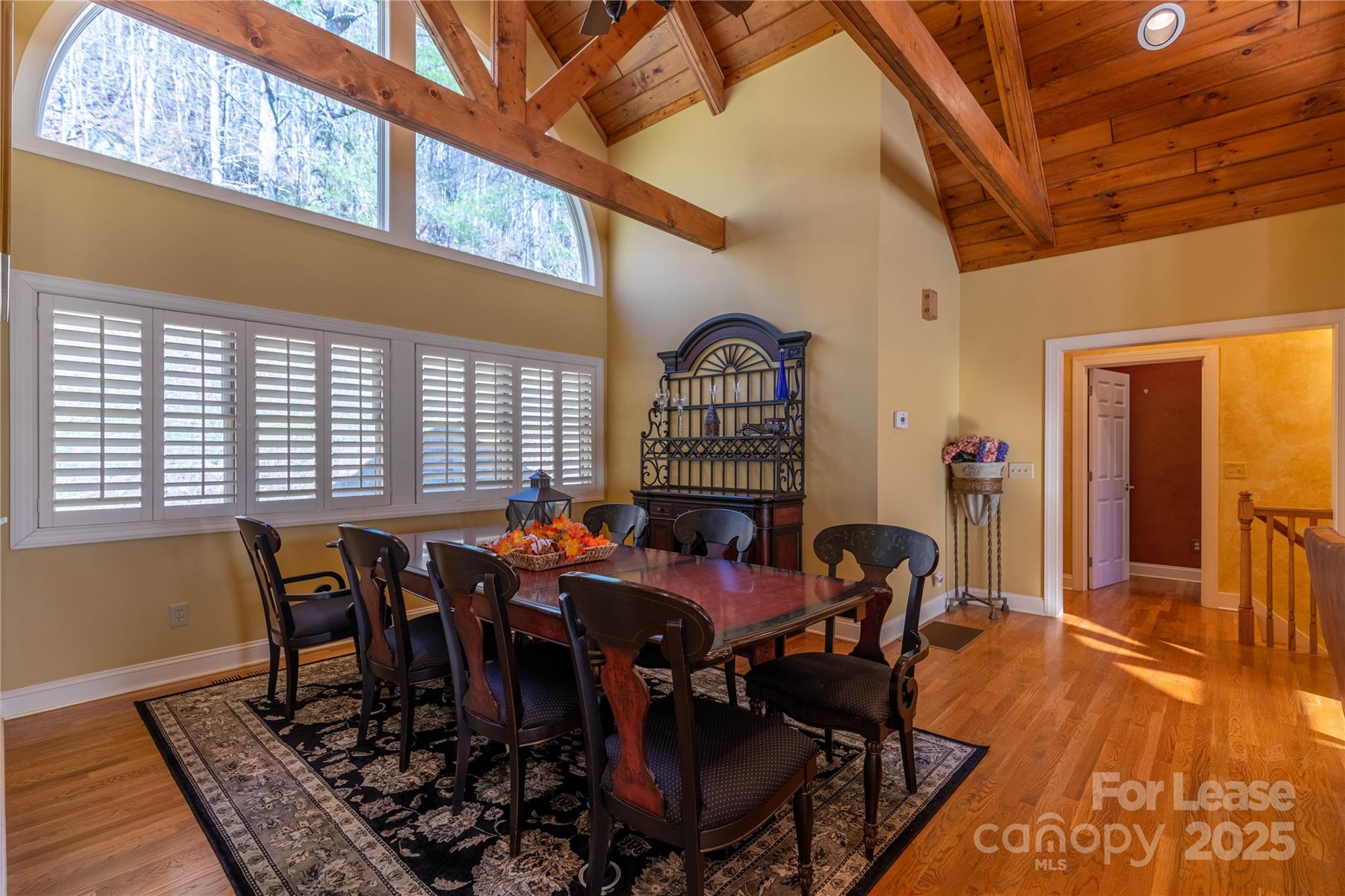 446 Windridge Drive Sugar Grove, NC 28679 - Photo 11 of 37 a view of a dining room with furniture window and wooden floor