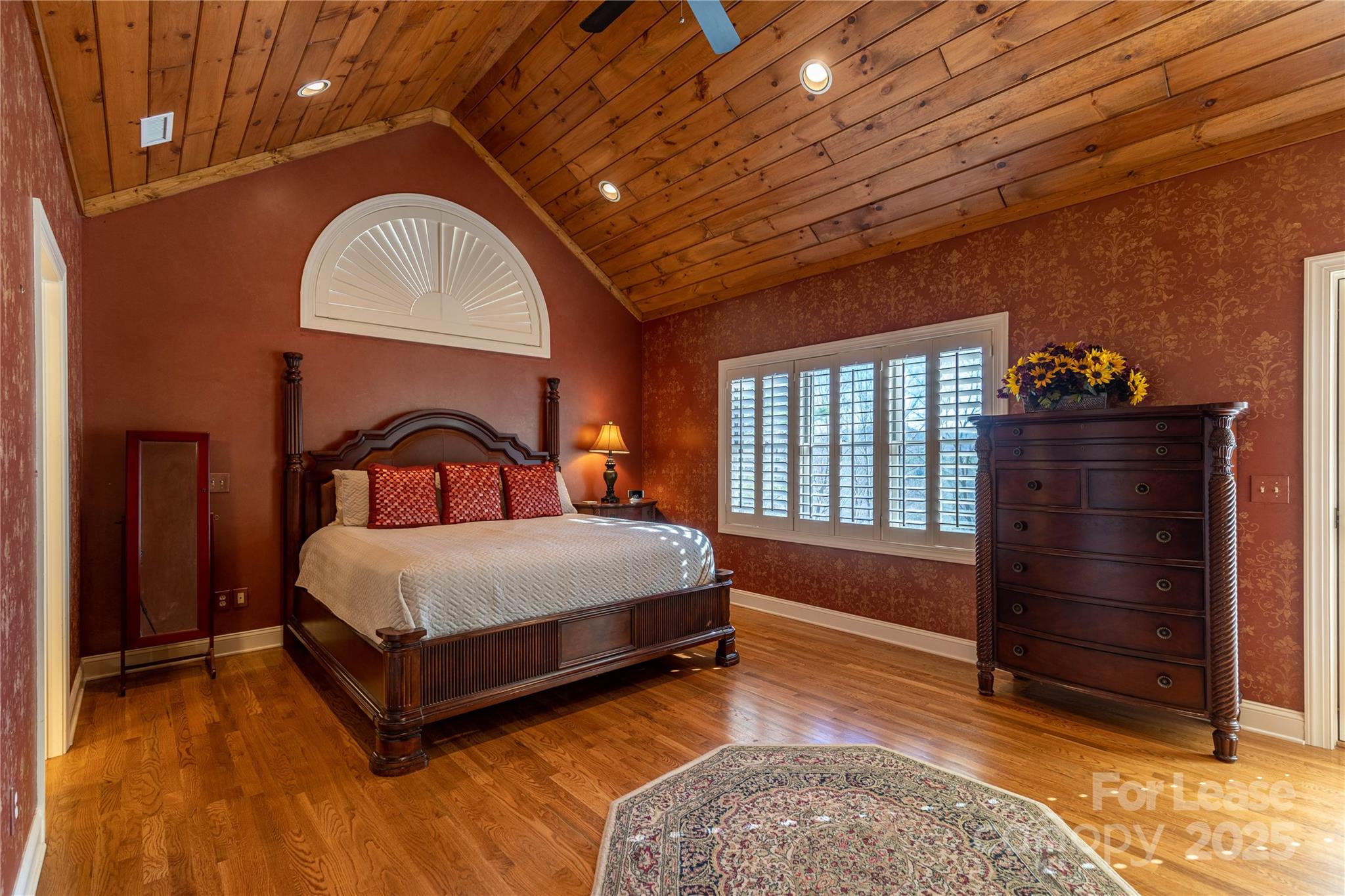 446 Windridge Drive Sugar Grove, NC 28679 - Photo 14 of 37 a spacious bedroom with a bed and a dresser