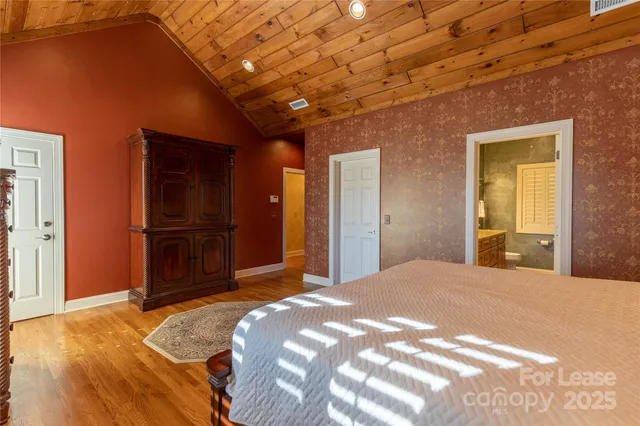 a bathroom with a sink double vanity and a mirror