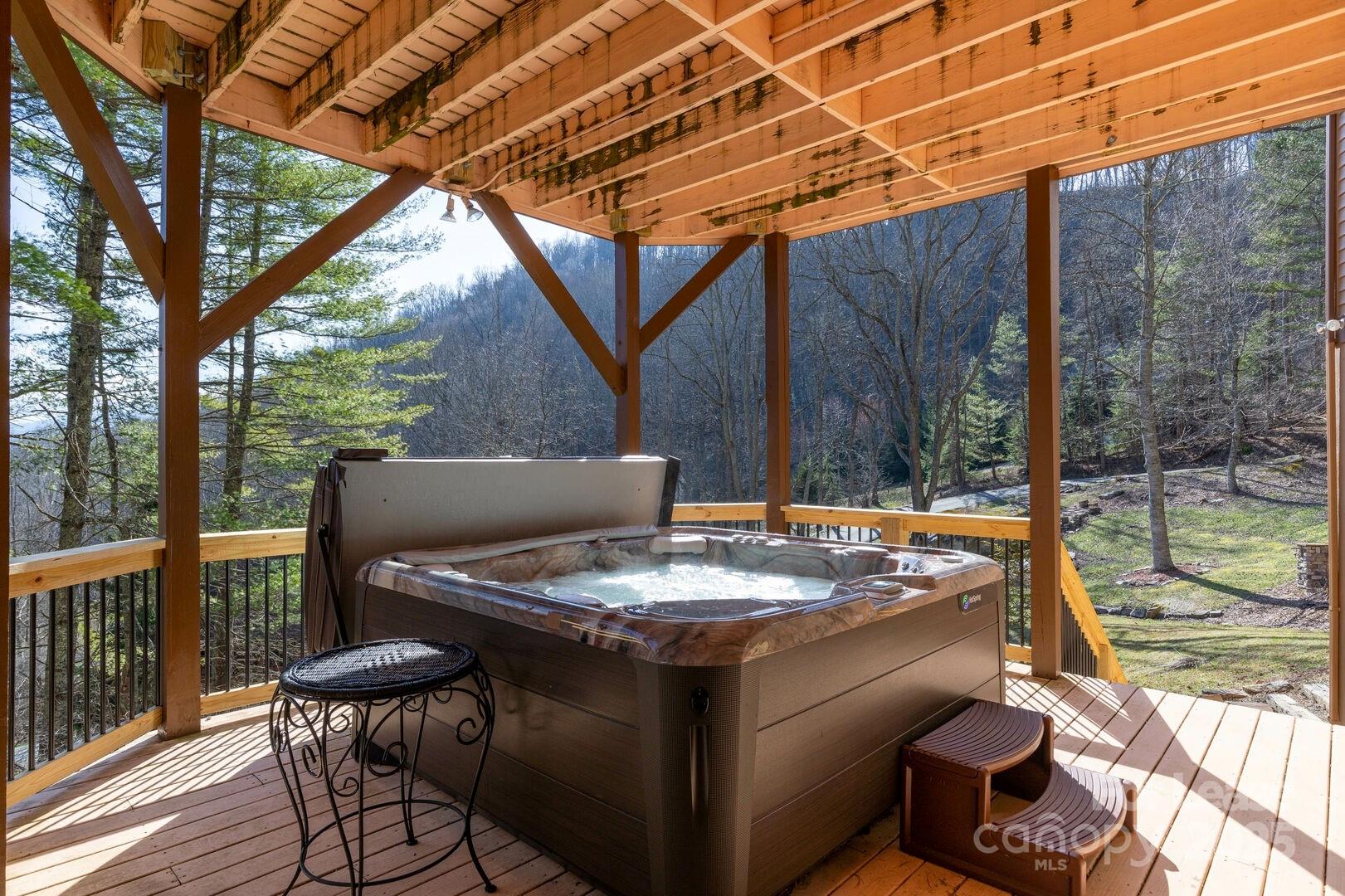 446 Windridge Drive Sugar Grove, NC 28679 - Photo 27 of 37 a view of an outdoor space with a patio