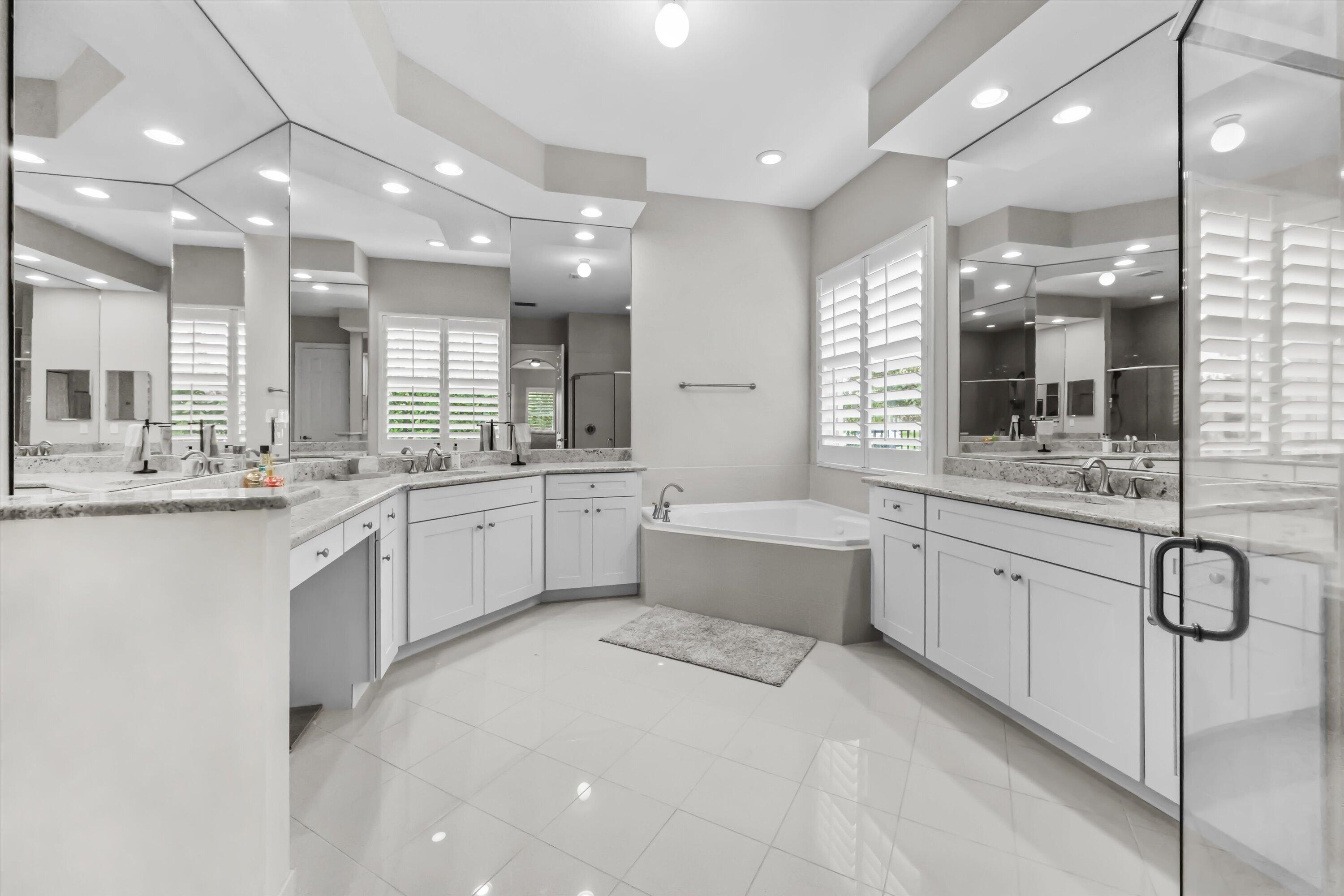 108 Casa Circle Jupiter, FL 33458 - Photo 20 of 53 a large white kitchen with a large window
