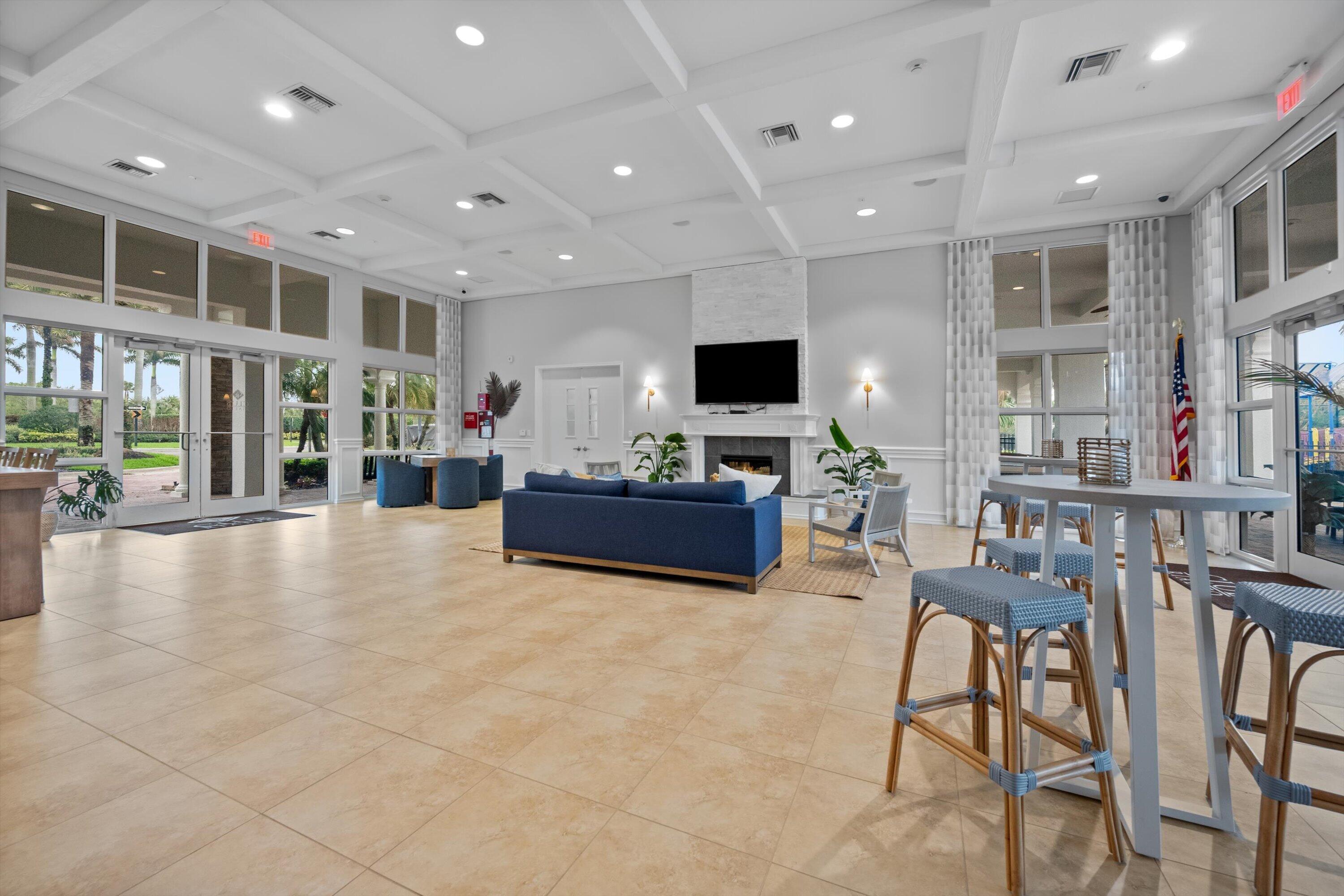 108 Casa Circle Jupiter, FL 33458 - Photo 40 of 53 a living room with furniture and a flat screen tv