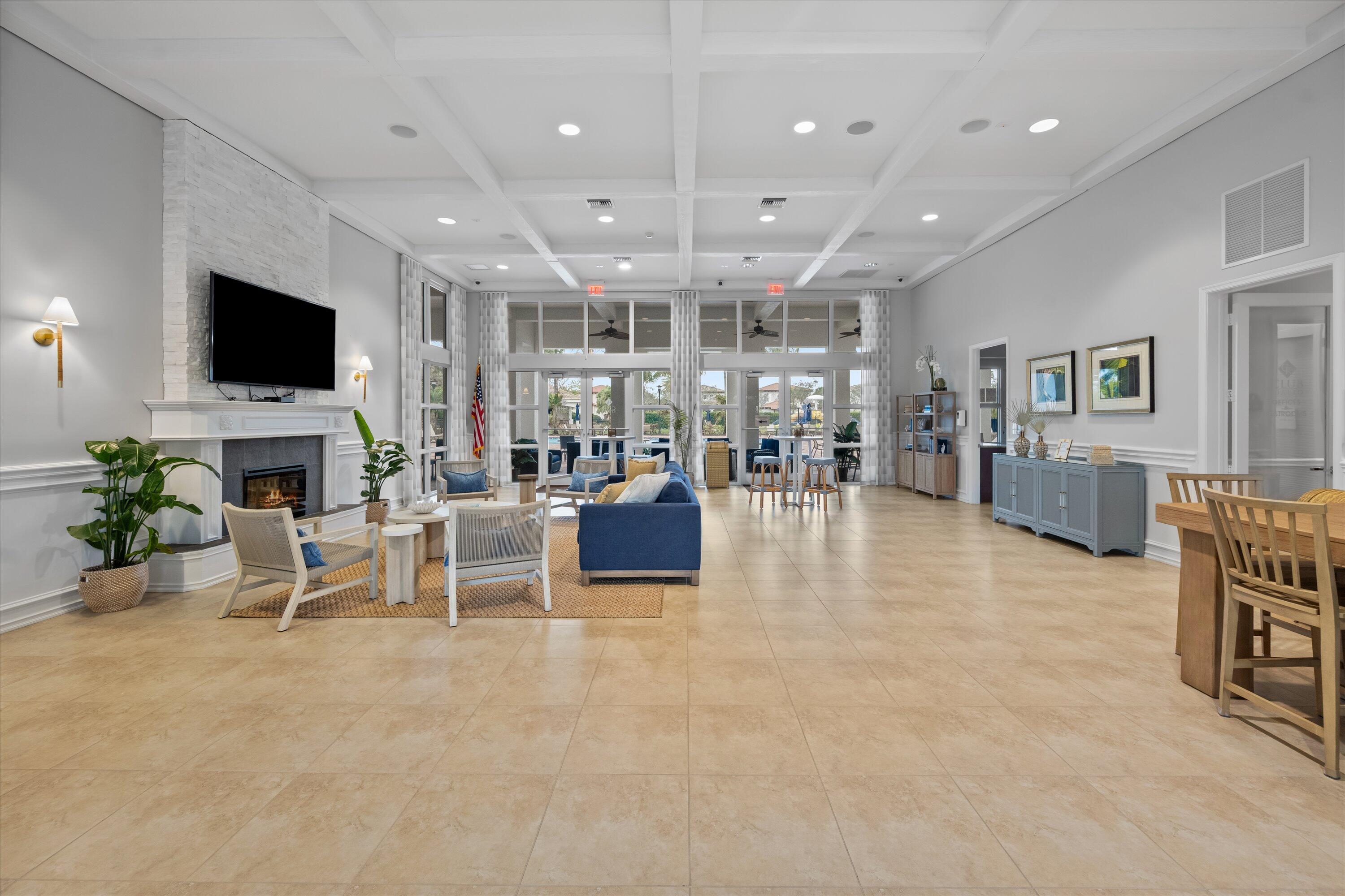 108 Casa Circle Jupiter, FL 33458 - Photo 41 of 53 a living room with furniture and a flat screen tv