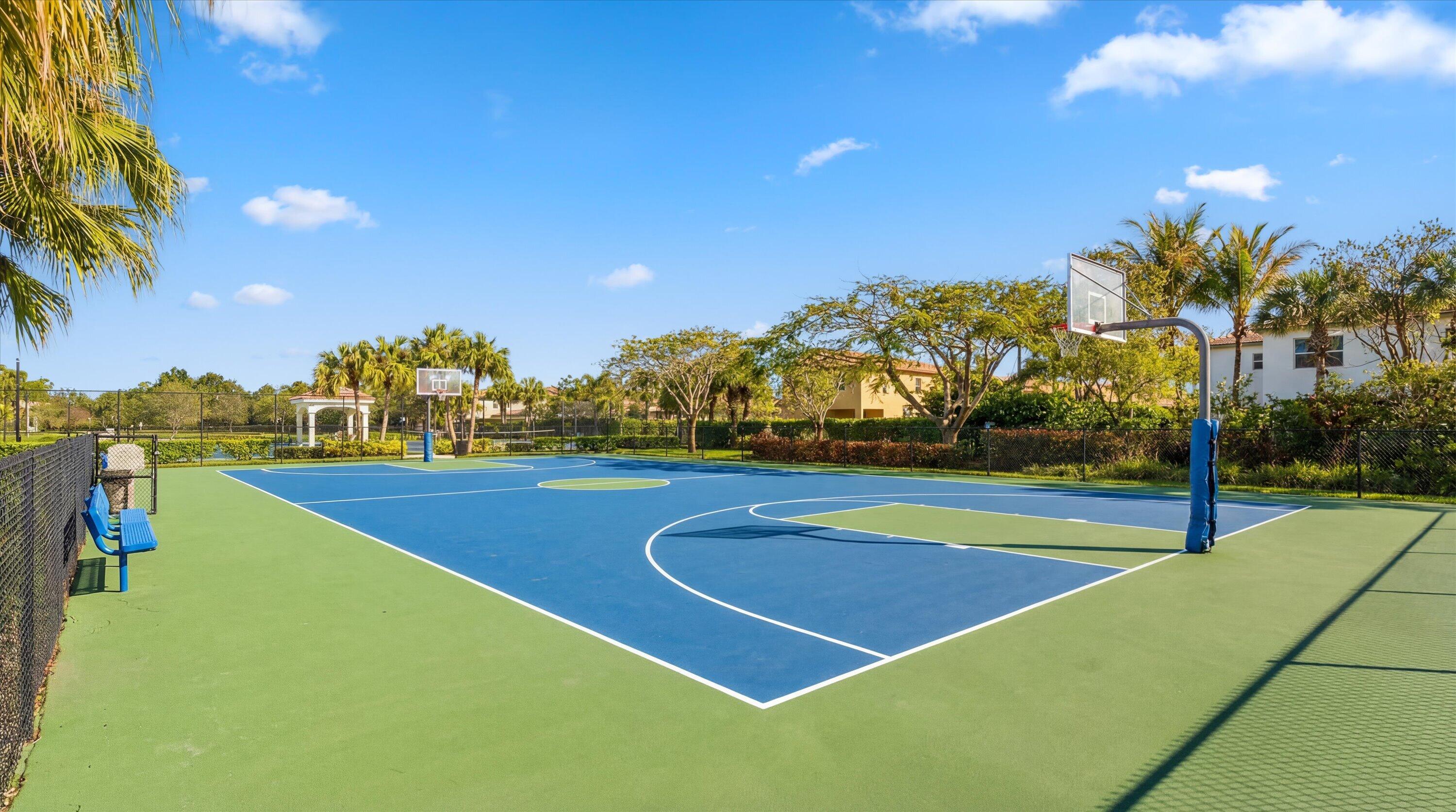 108 Casa Circle Jupiter, FL 33458 - Photo 51 of 53 a view of an outdoor space and basketball court