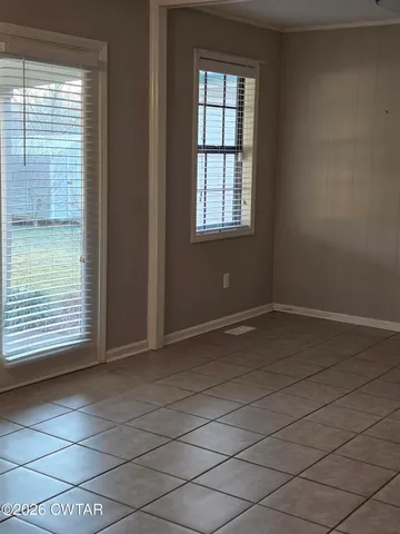 an empty room with windows