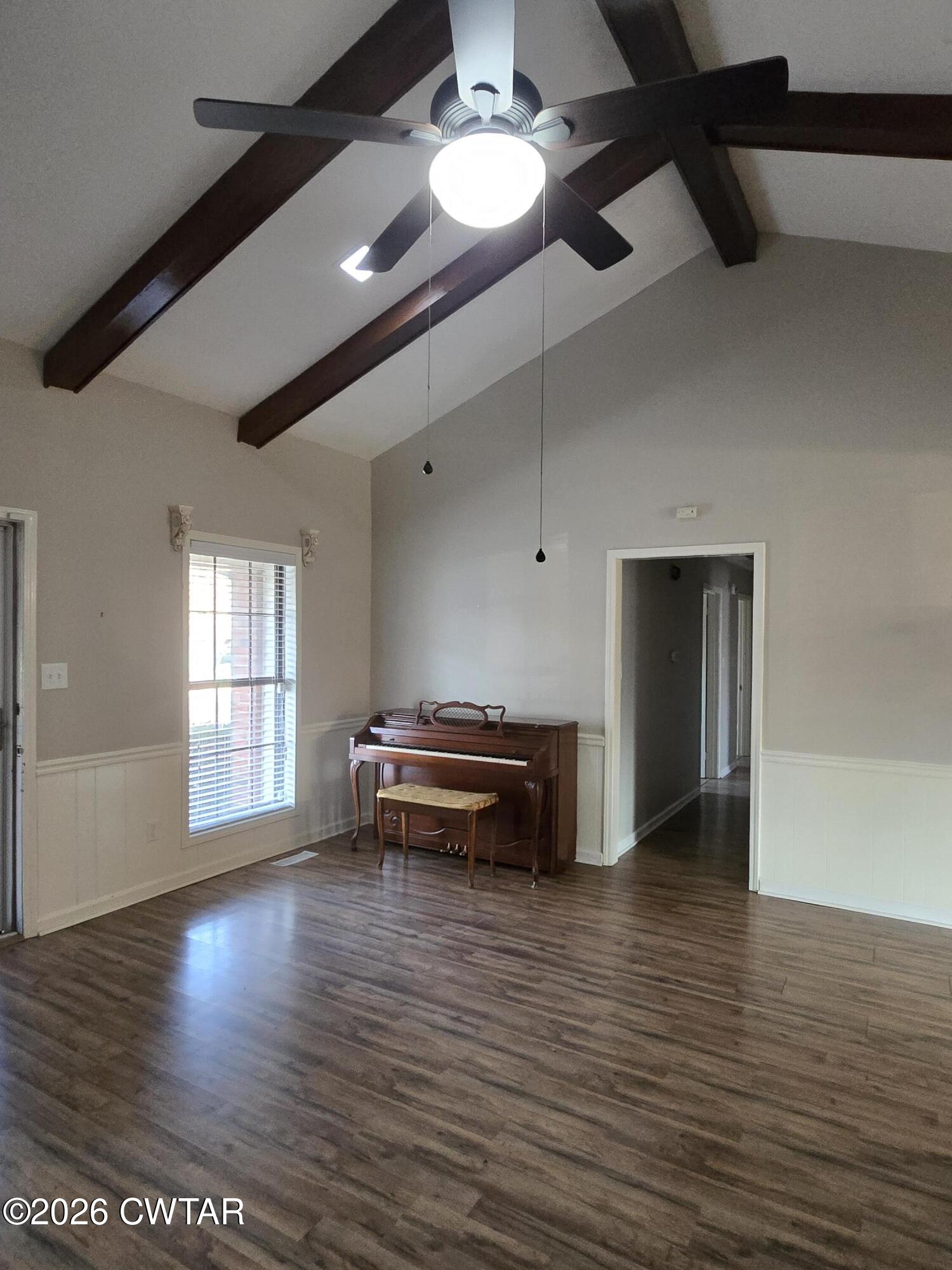 18 Lake Avenue Jackson, TN 38301 - Photo 9 of 19 a view of empty room with wooden floor and fan