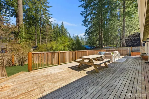 a view of backyard with a patio and wooden floor