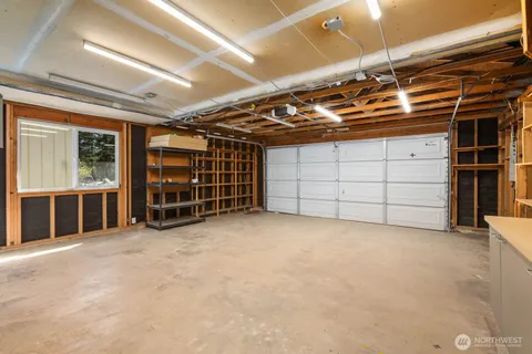 a view of a garage room with garage